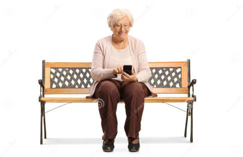 Photo with a white background that shows a senior woman sitting on a bench, touching the screen of her smartphone.